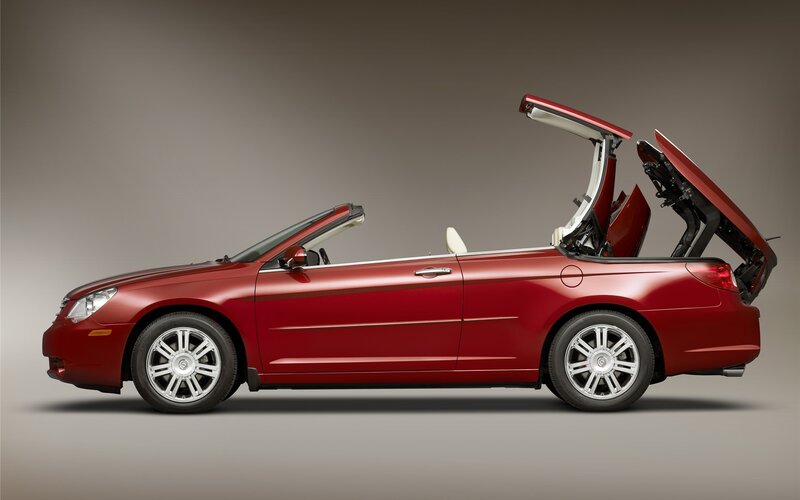 red convertible car with open roof
