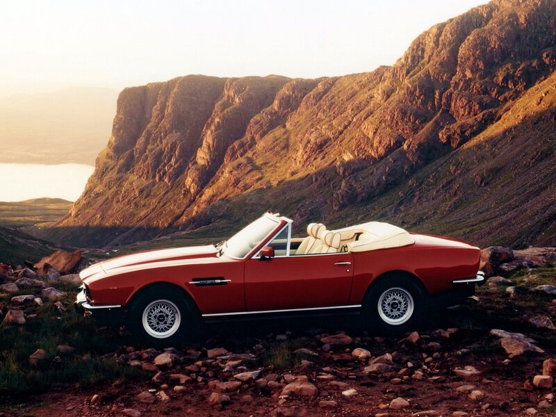 Red convertible on a cliffside