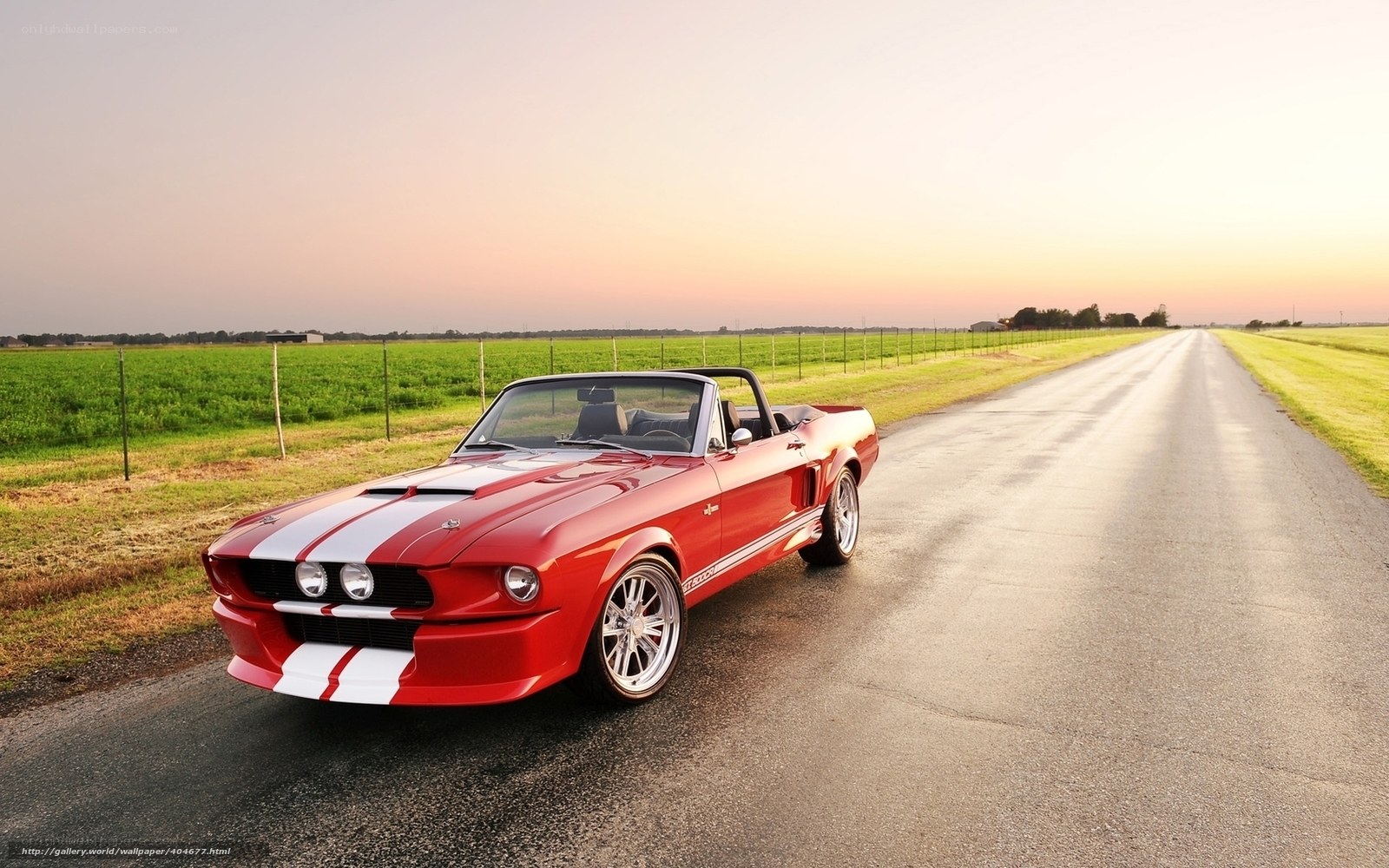 Red convertible on country road