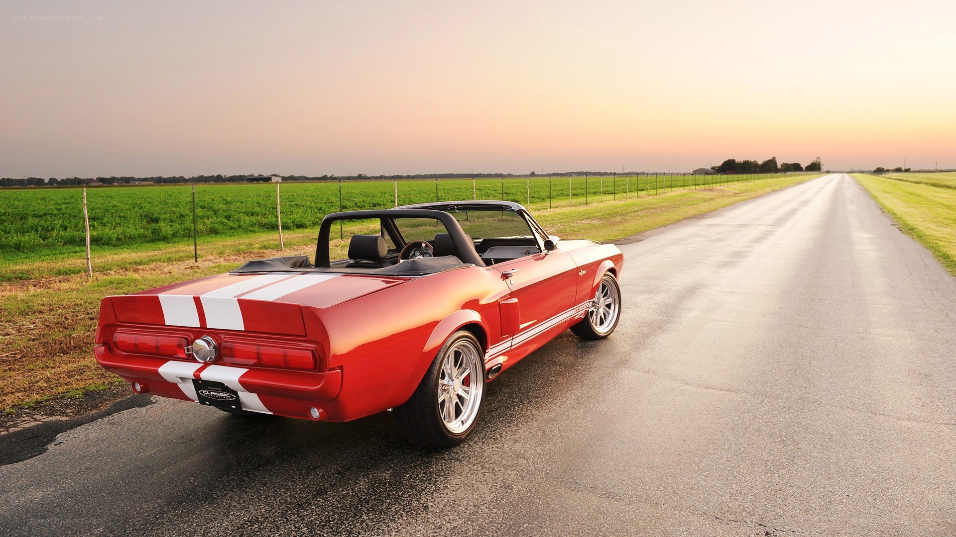 Red convertible on country road
