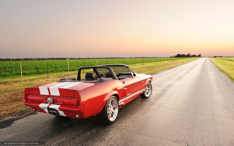 Red convertible on country road