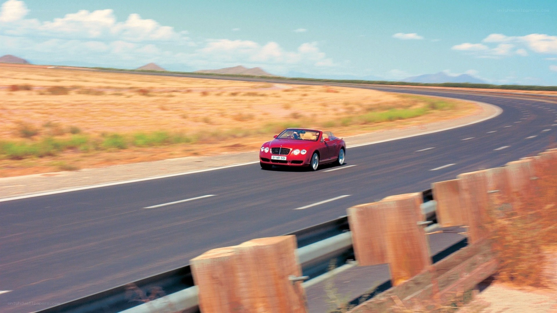 red convertible on desert road