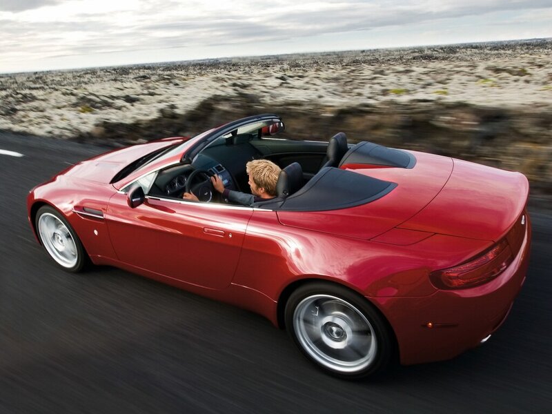 Red convertible sports car driving