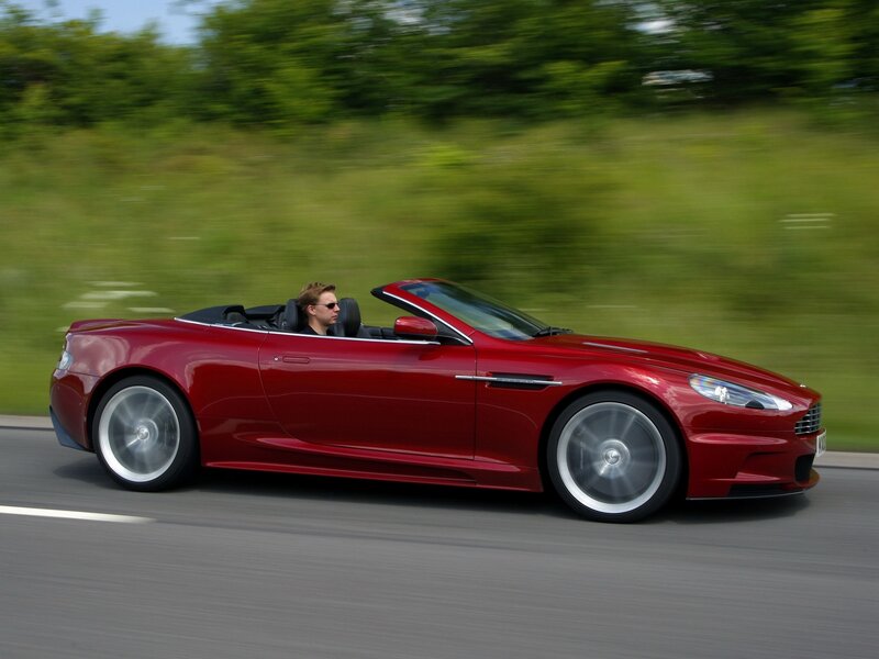Red convertible sports car in motion
