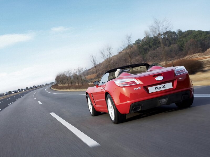 Red convertible sports car on road