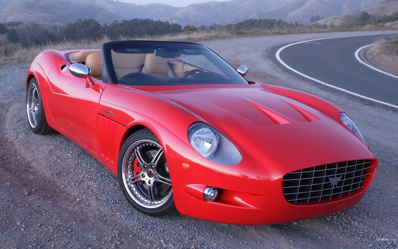 Red convertible sports car on road