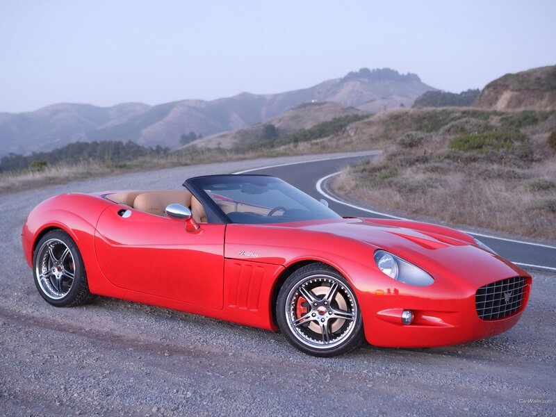 Red convertible sports car on road