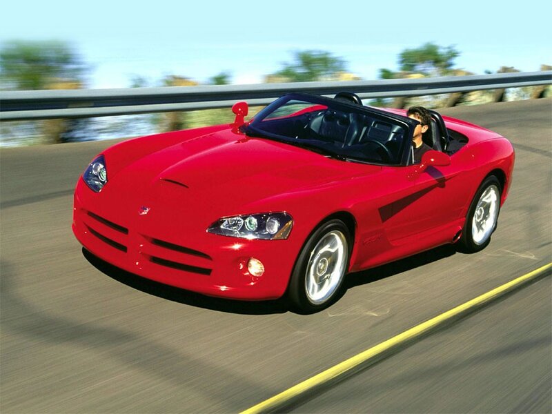 Red convertible sports car on road