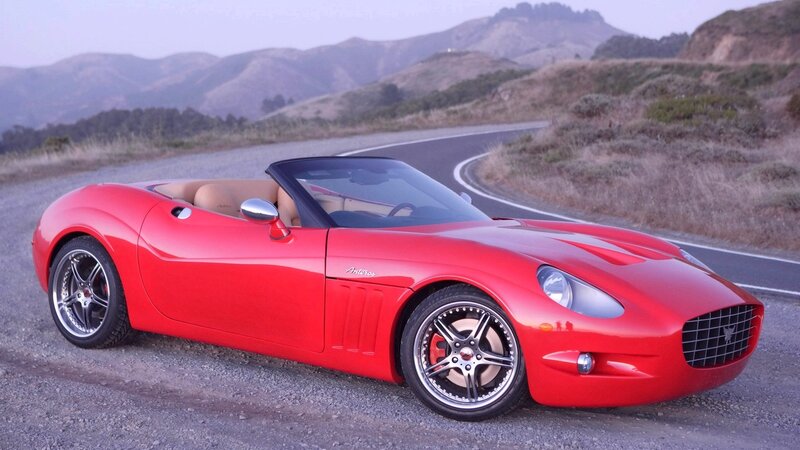Red convertible sports car on road