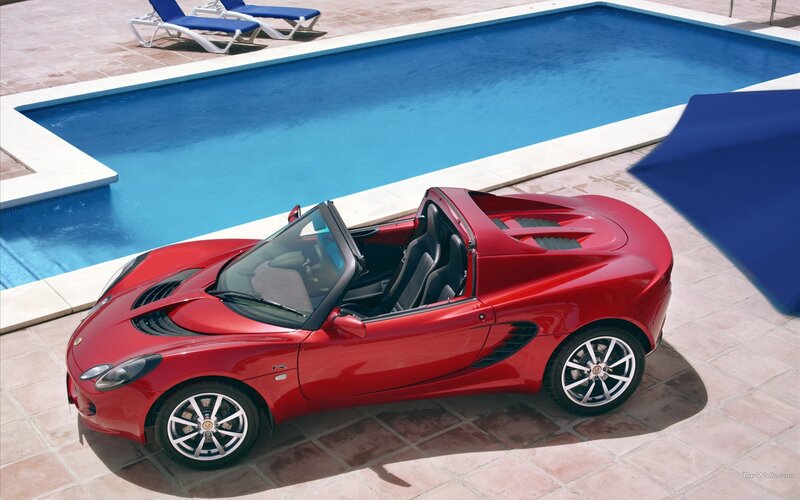 Red Convertible Sports Car — Serene, Afternoon, Photograph, Swimming Pool, Lounge Chairs, Umbrella