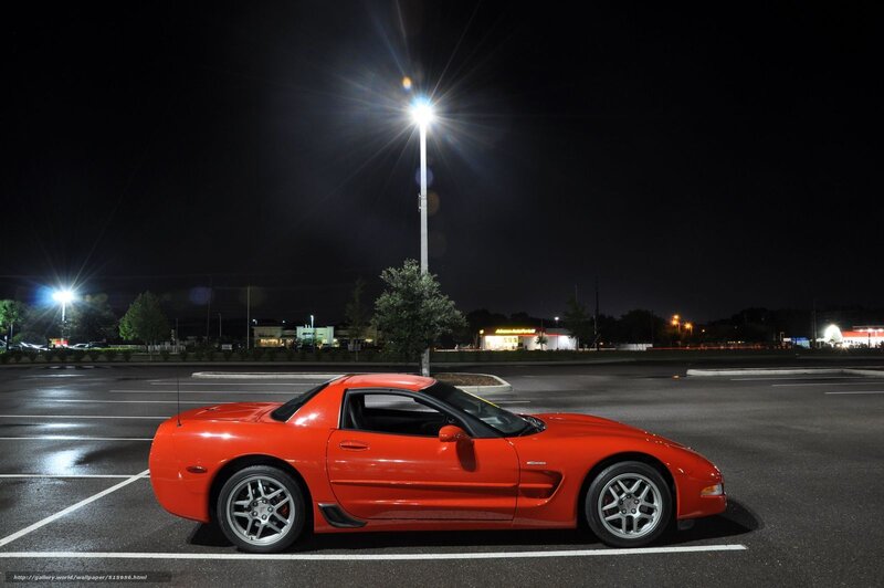 Red Corvette at night