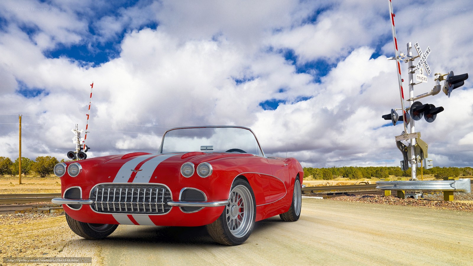 Red Corvette at railroad crossing