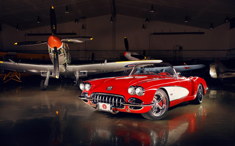Red Corvette Convertible — Dramatic, Photograph, Airplane, Hangar