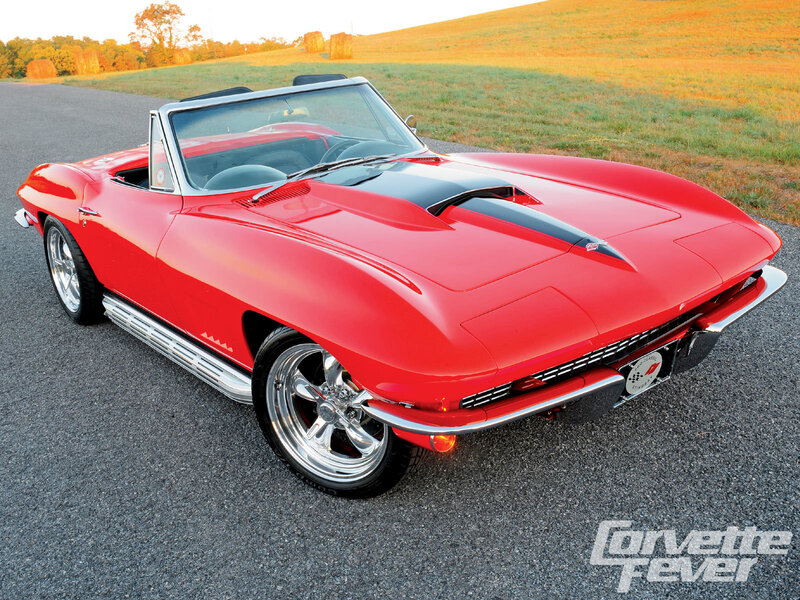 Red Corvette convertible on road