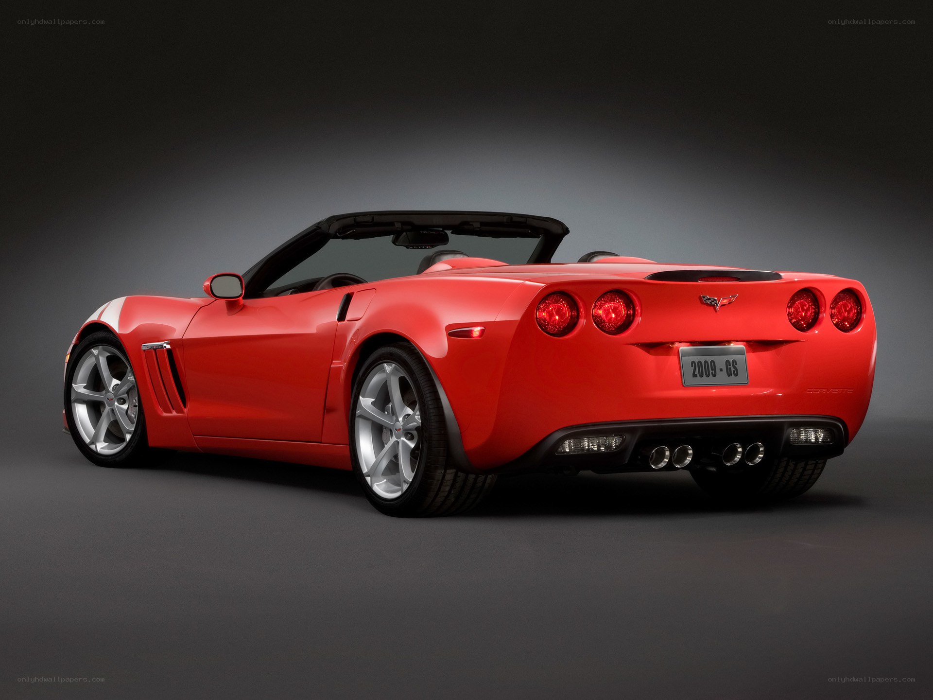 Red Corvette convertible rear view