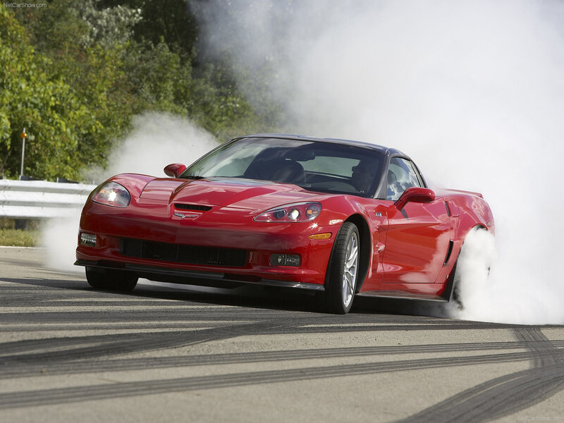 red corvette doing burnout