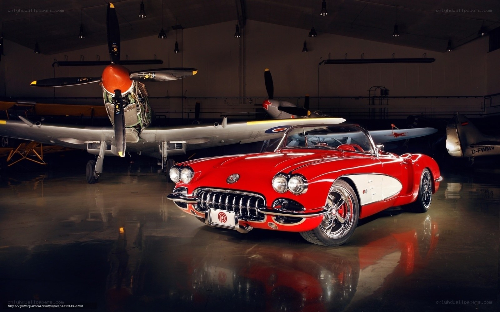 Red Corvette in Airplane Hangar