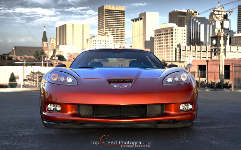 red corvette in city