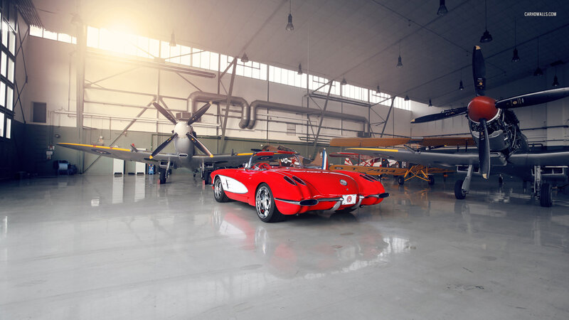 Red Corvette in Hangar — Dramatic
