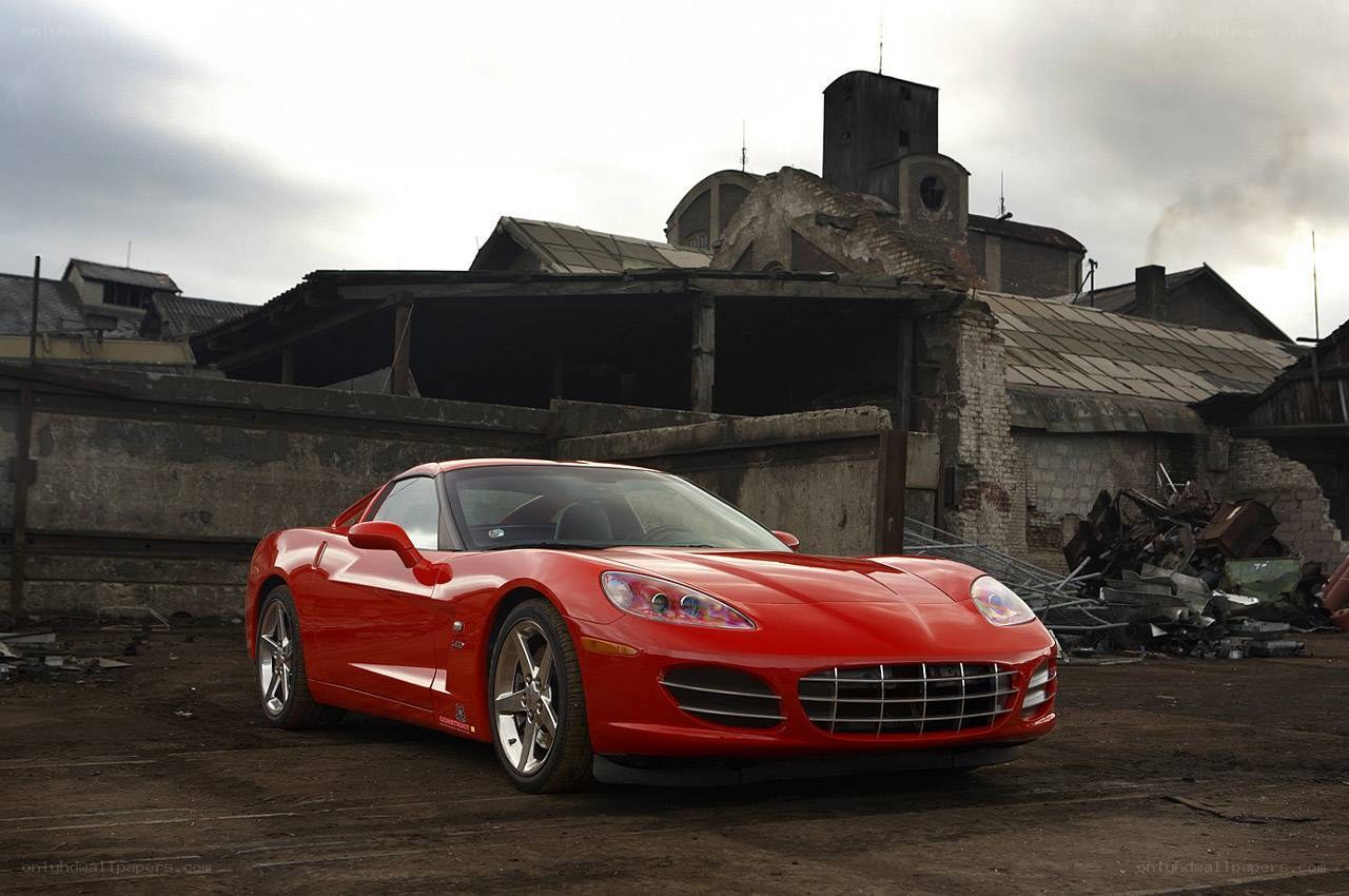 Red Corvette in industrial setting