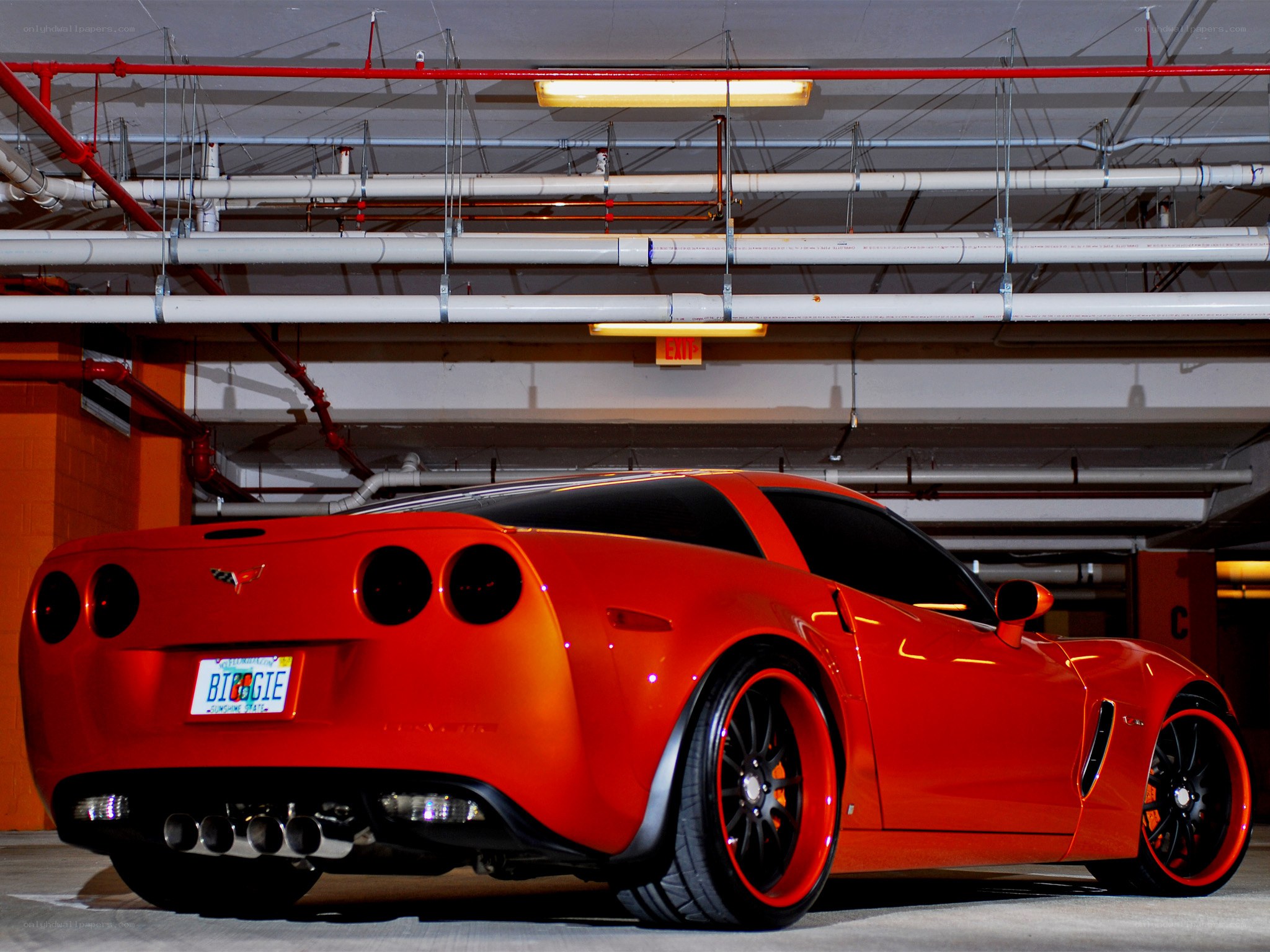 Red Corvette in parking garage