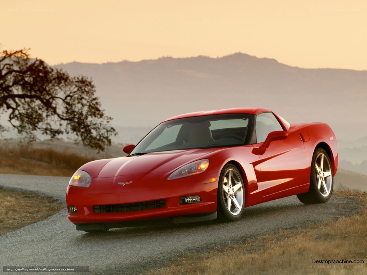 Red Corvette on a country road