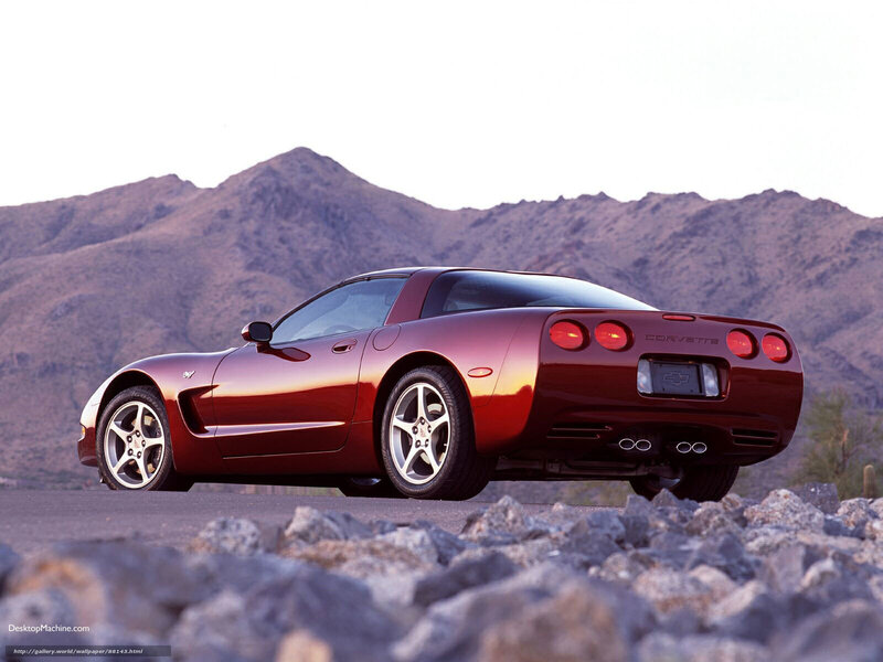 Red Corvette on a desert road