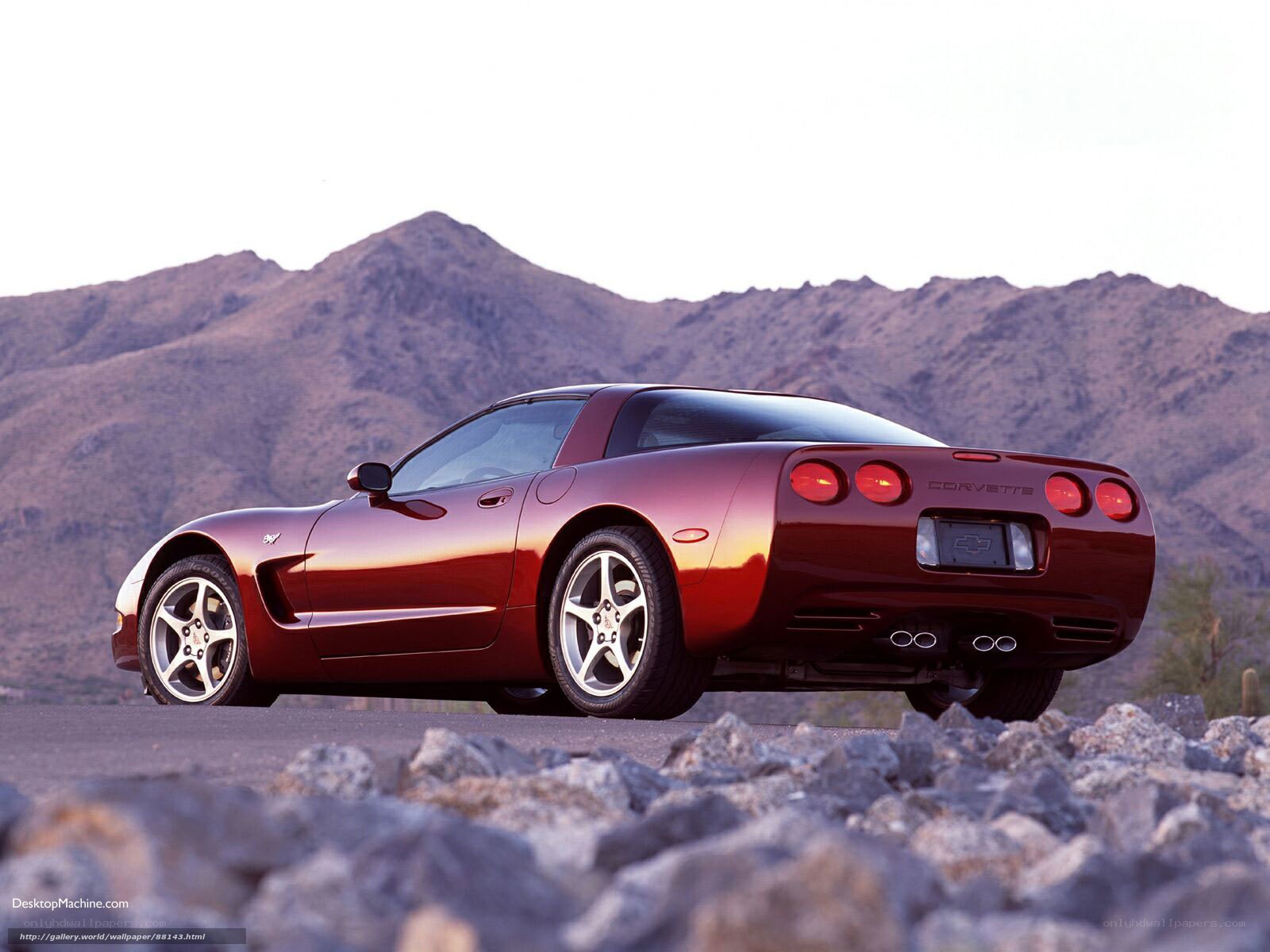 Red Corvette on a desert road