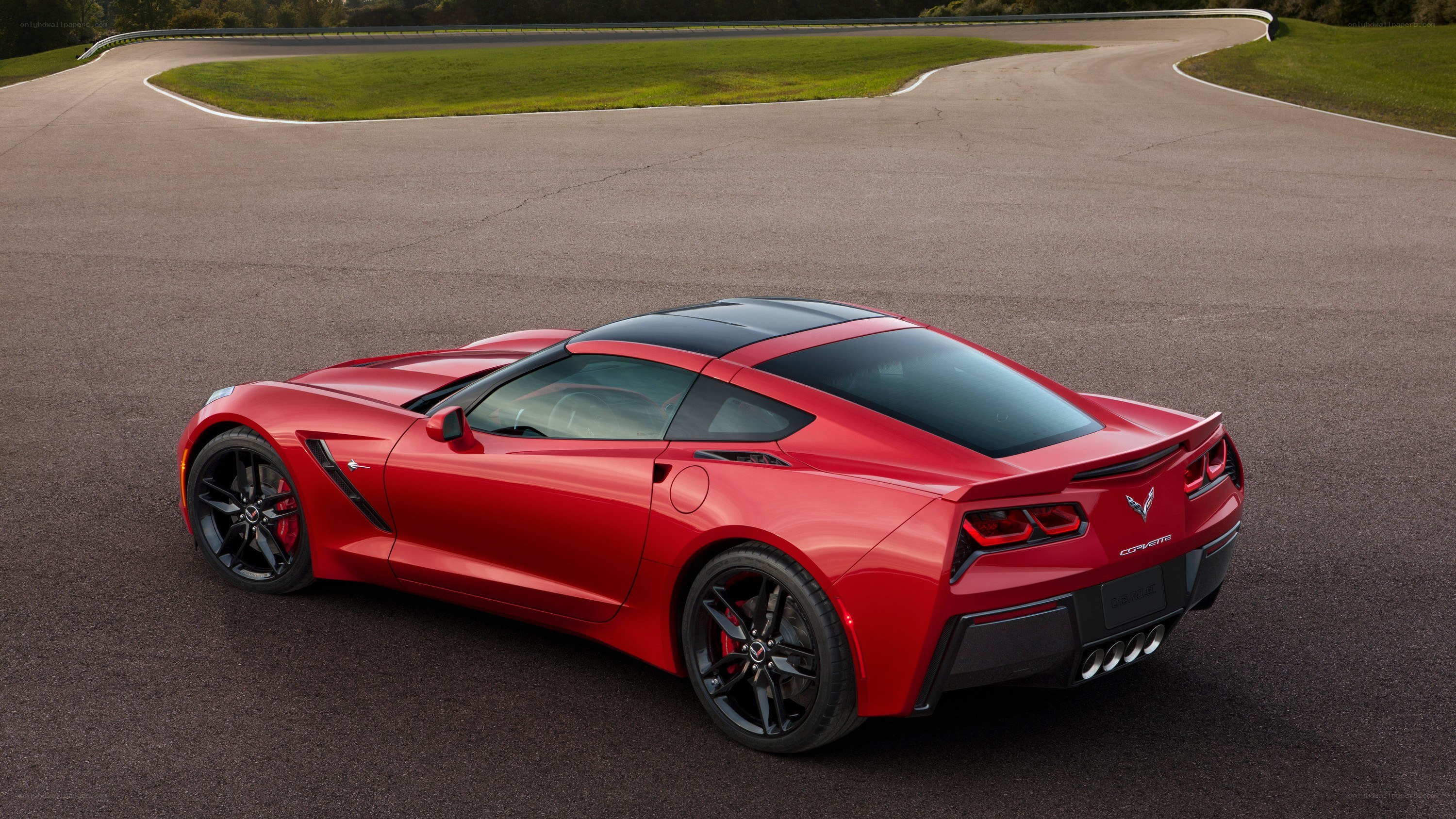 Red Corvette on a racetrack