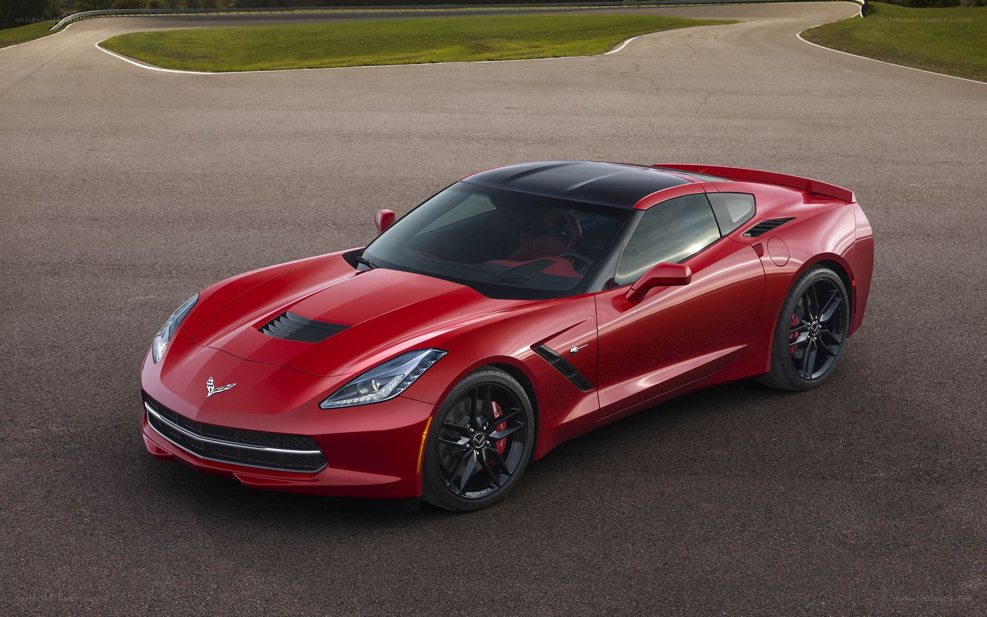 Red Corvette on a racetrack