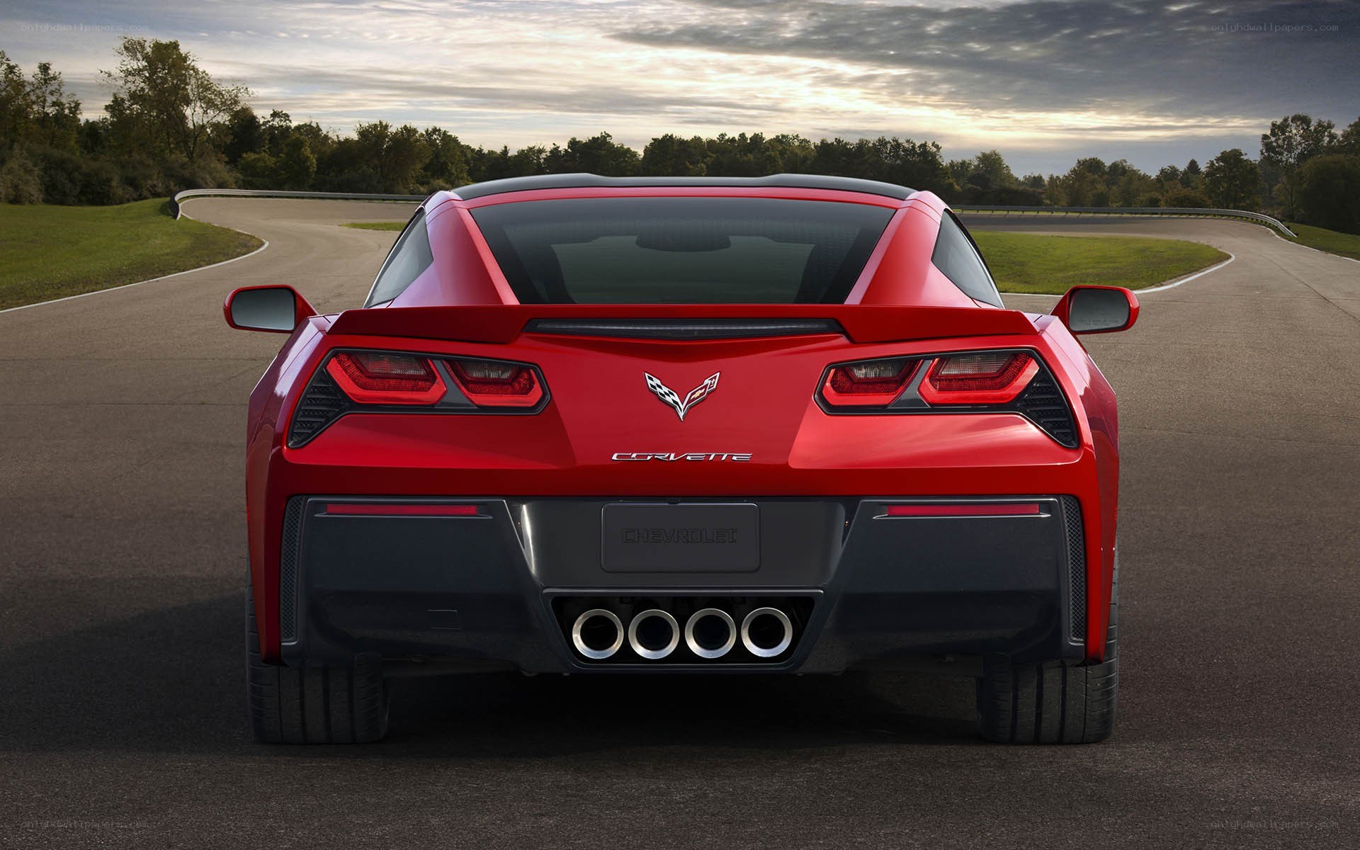 Red Corvette on a racetrack