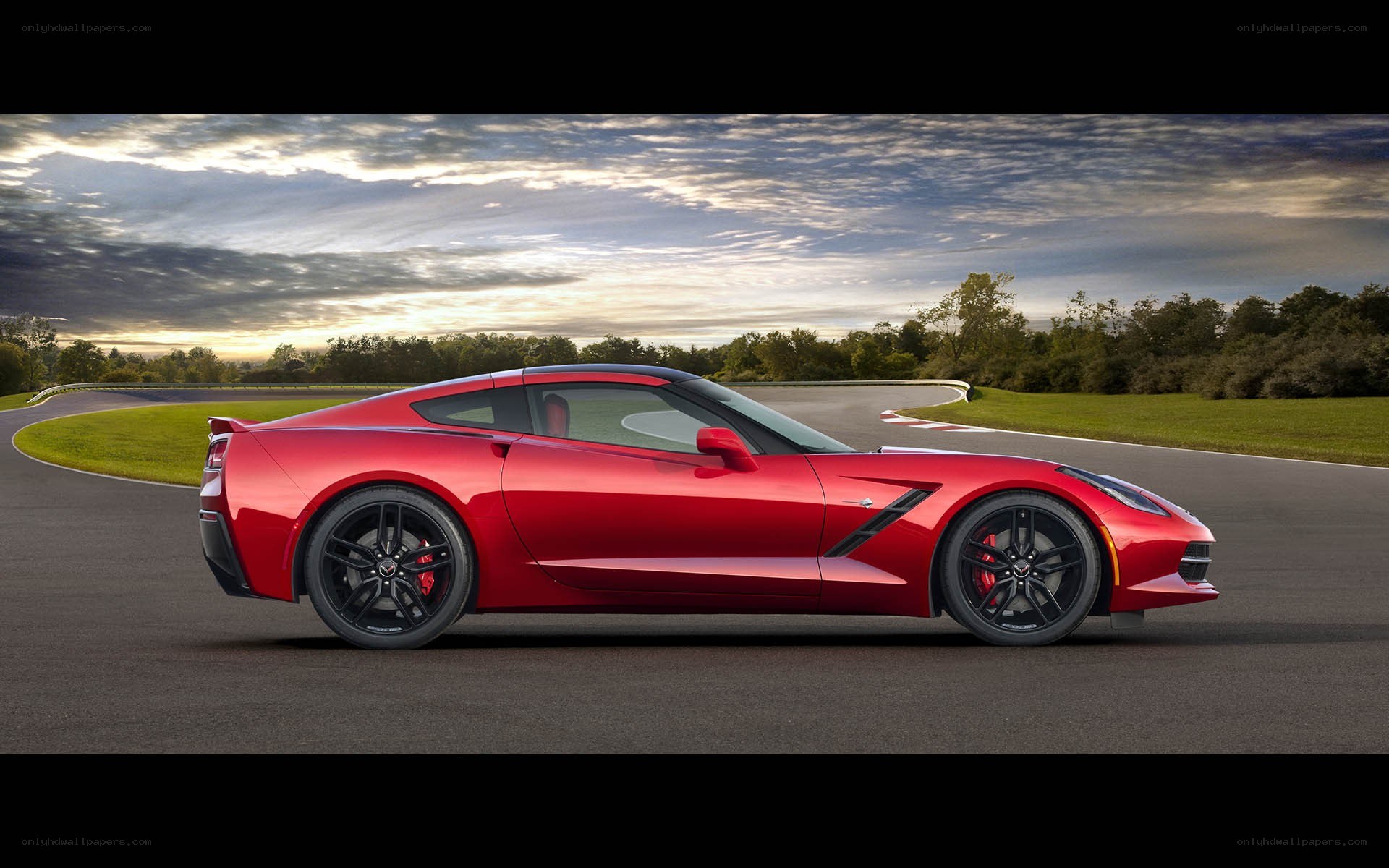 Red Corvette on a racetrack