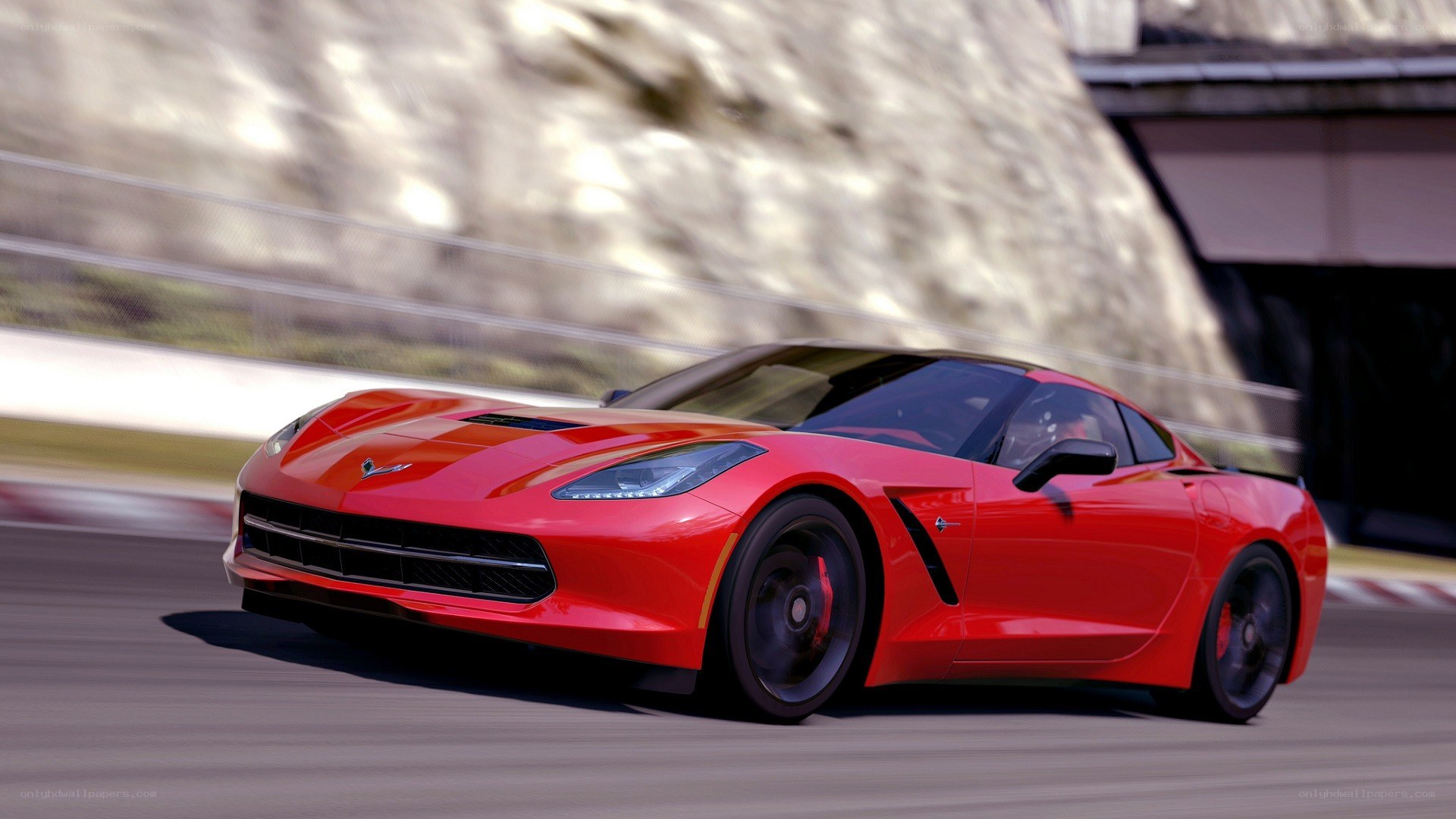 red corvette on a racetrack