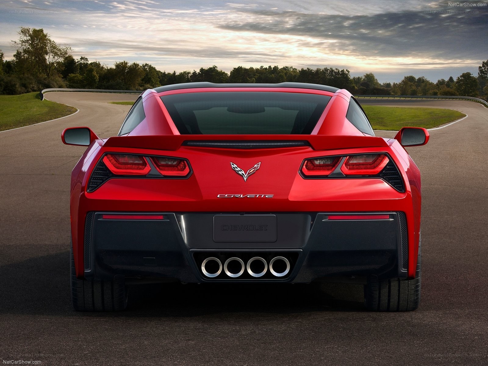 Red Corvette on a racetrack