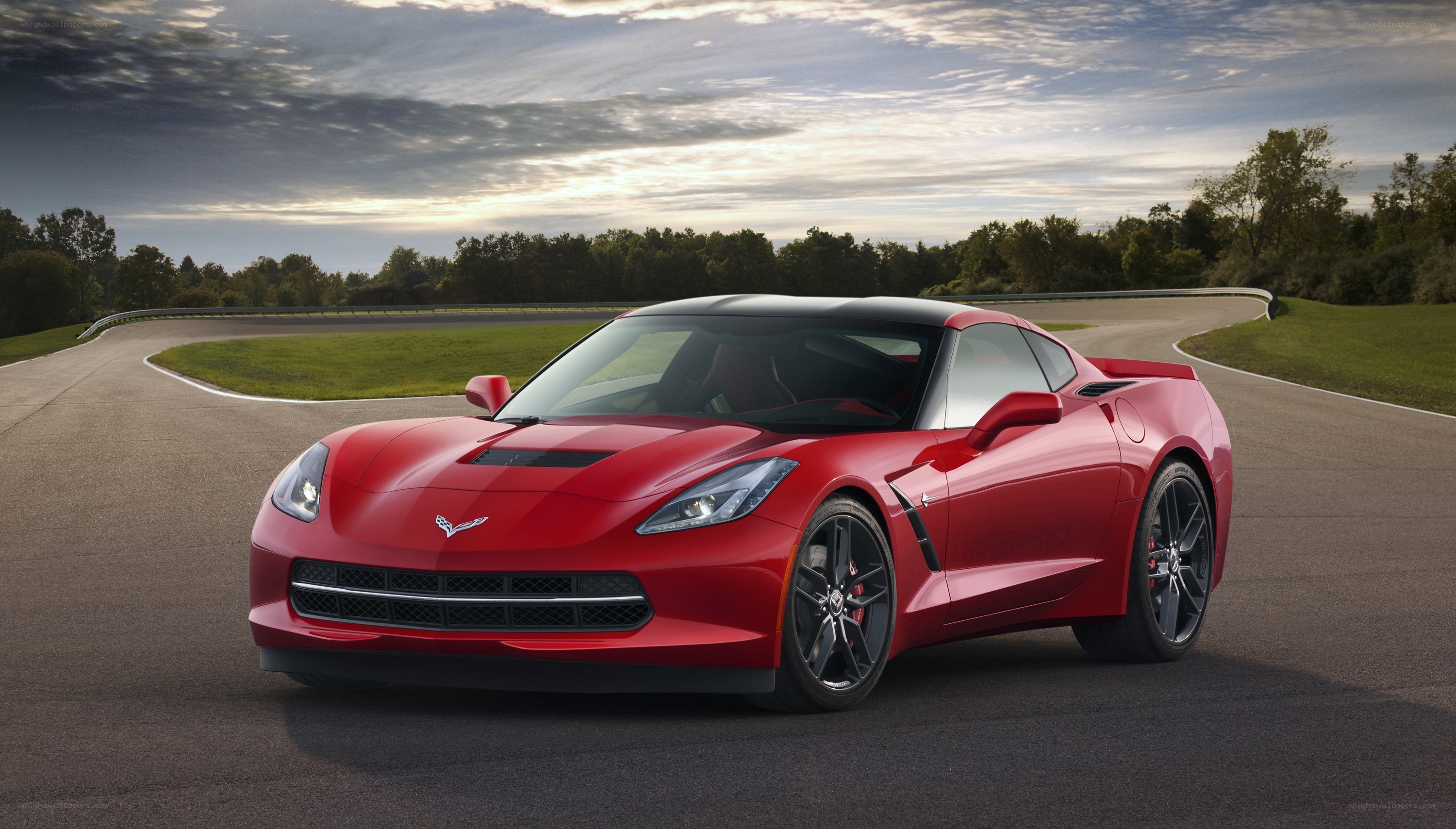 Red Corvette on a racetrack
