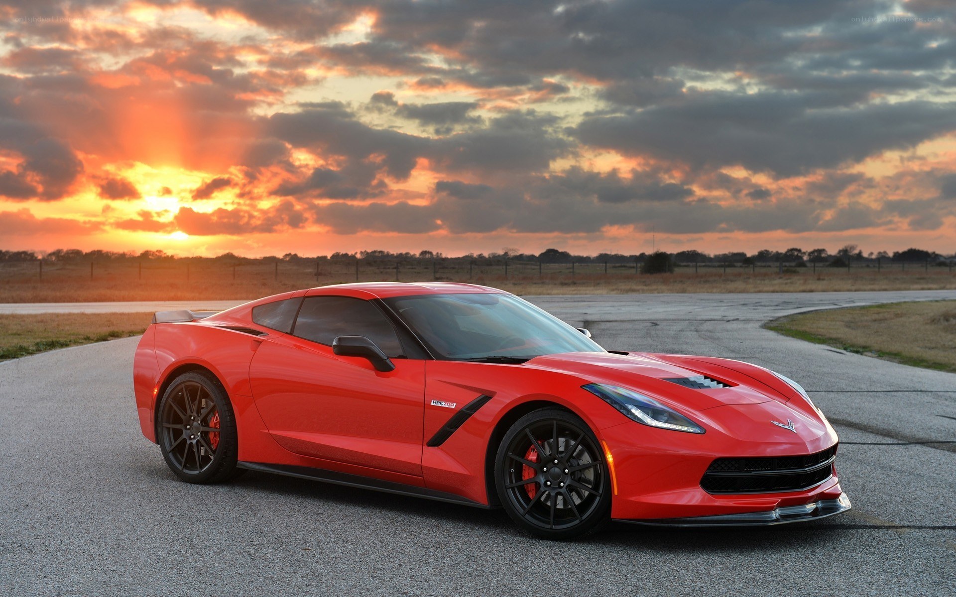 Red Corvette on a racetrack