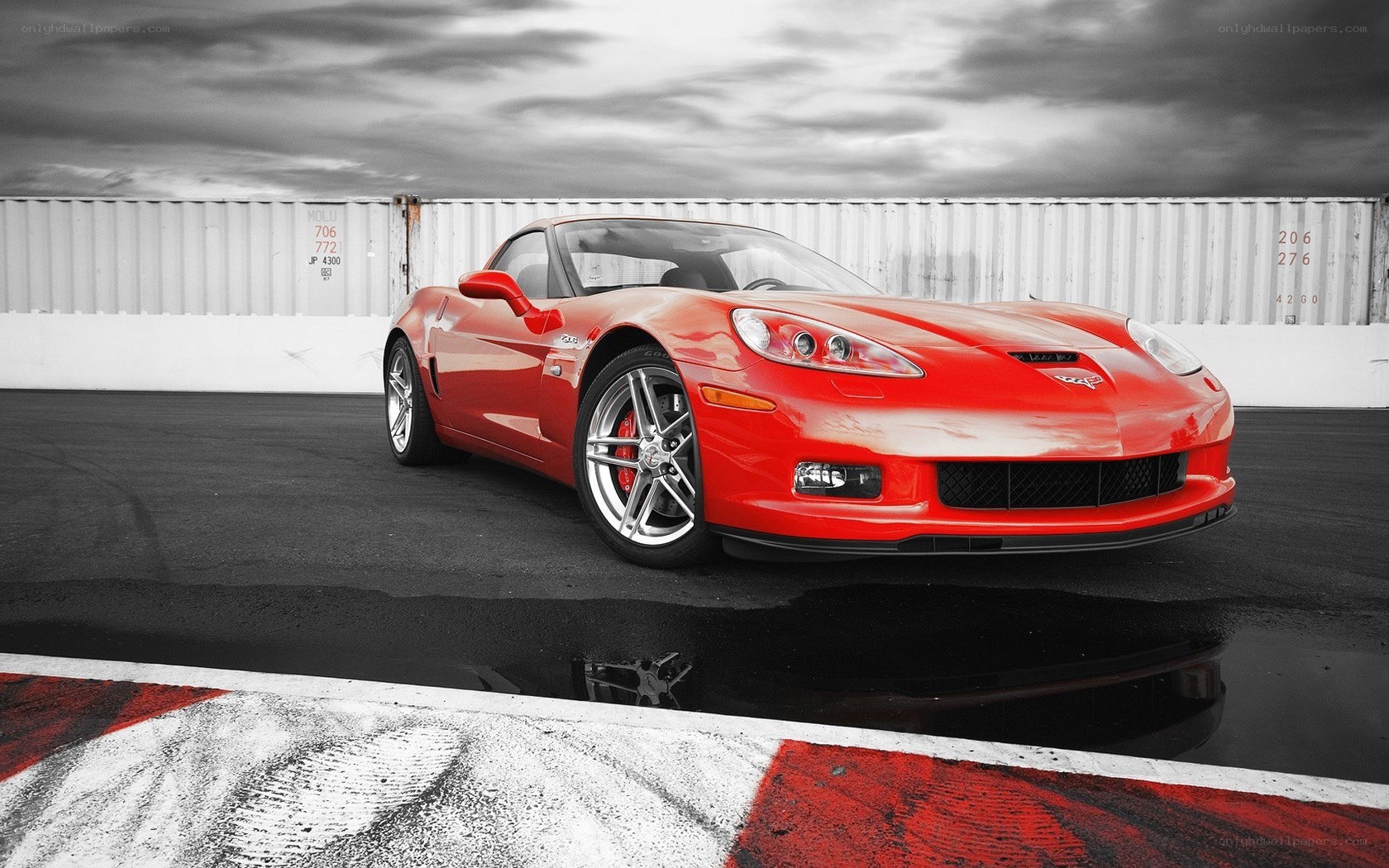 Red Corvette on a racetrack