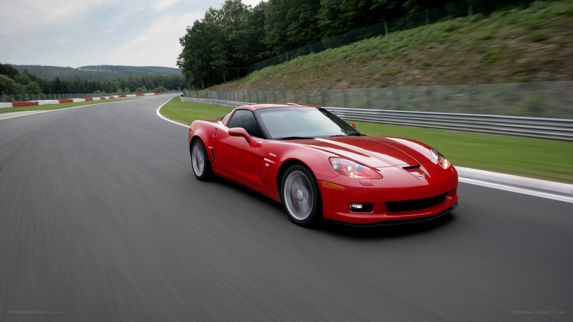 Red Corvette on a racetrack