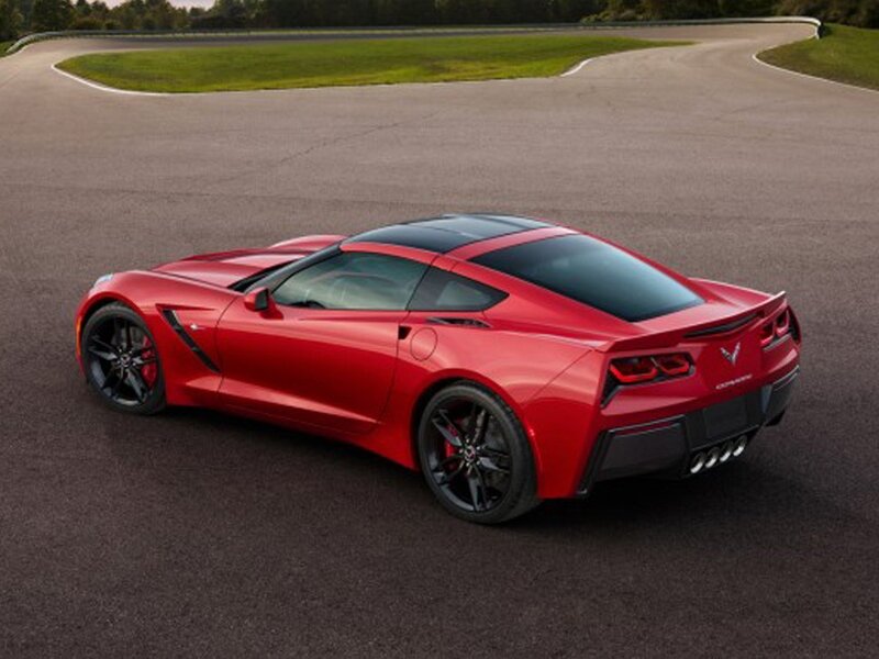 Red Corvette on a racetrack