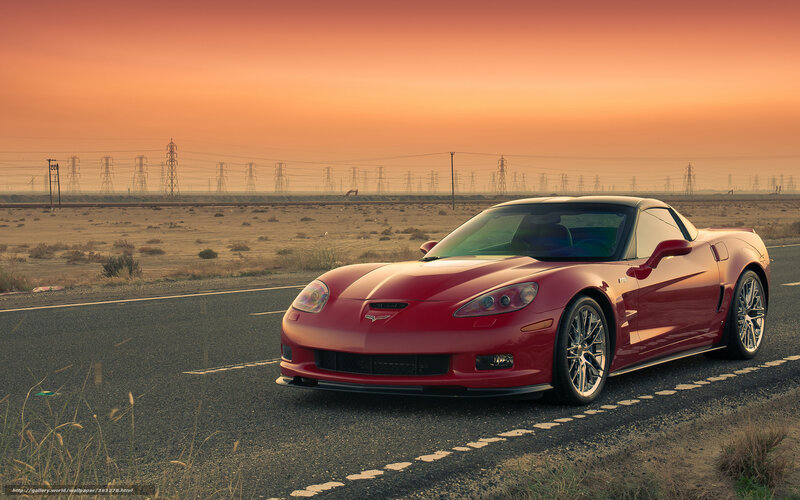 Red Corvette on desert road