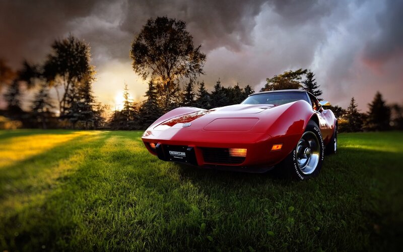 Red Corvette on Grass — Dramatic, Sunset, Photograph