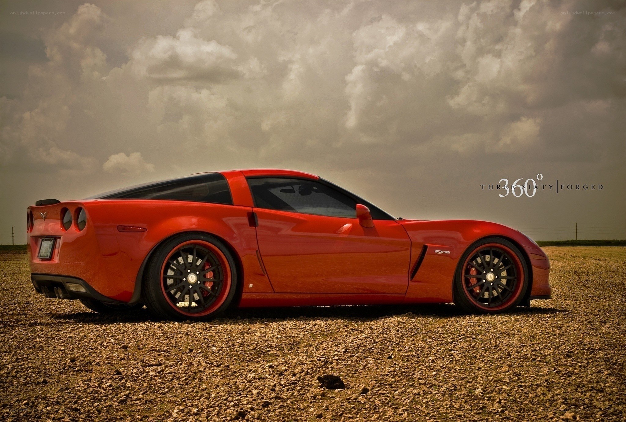 Red Corvette on gravel