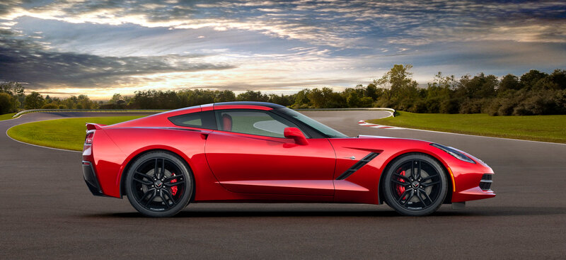 Red Corvette on Racetrack — Dramatic