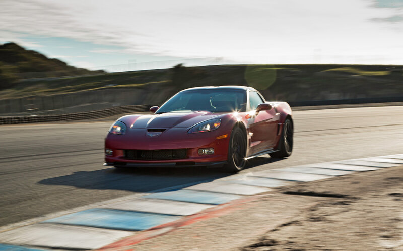 Red Corvette on Racetrack — Dynamic, Afternoon