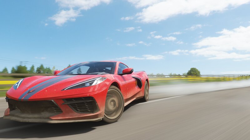 Red Corvette on Road — Dynamic, Afternoon