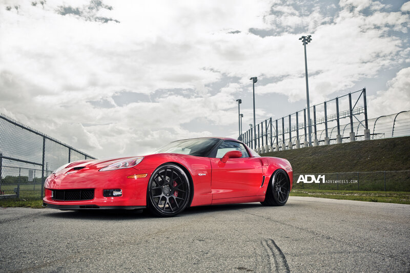 Red Corvette on Track — Dramatic