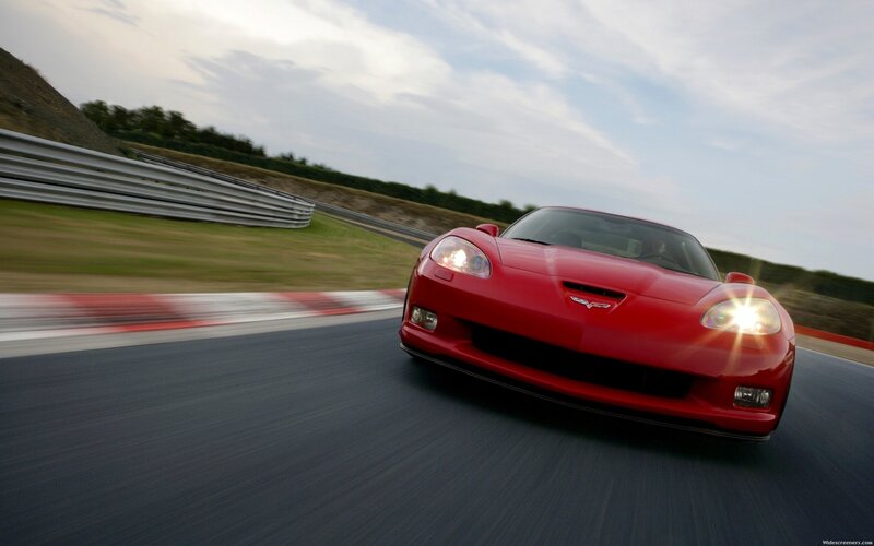 Red Corvette on Track — Dynamic, Afternoon, Photograph