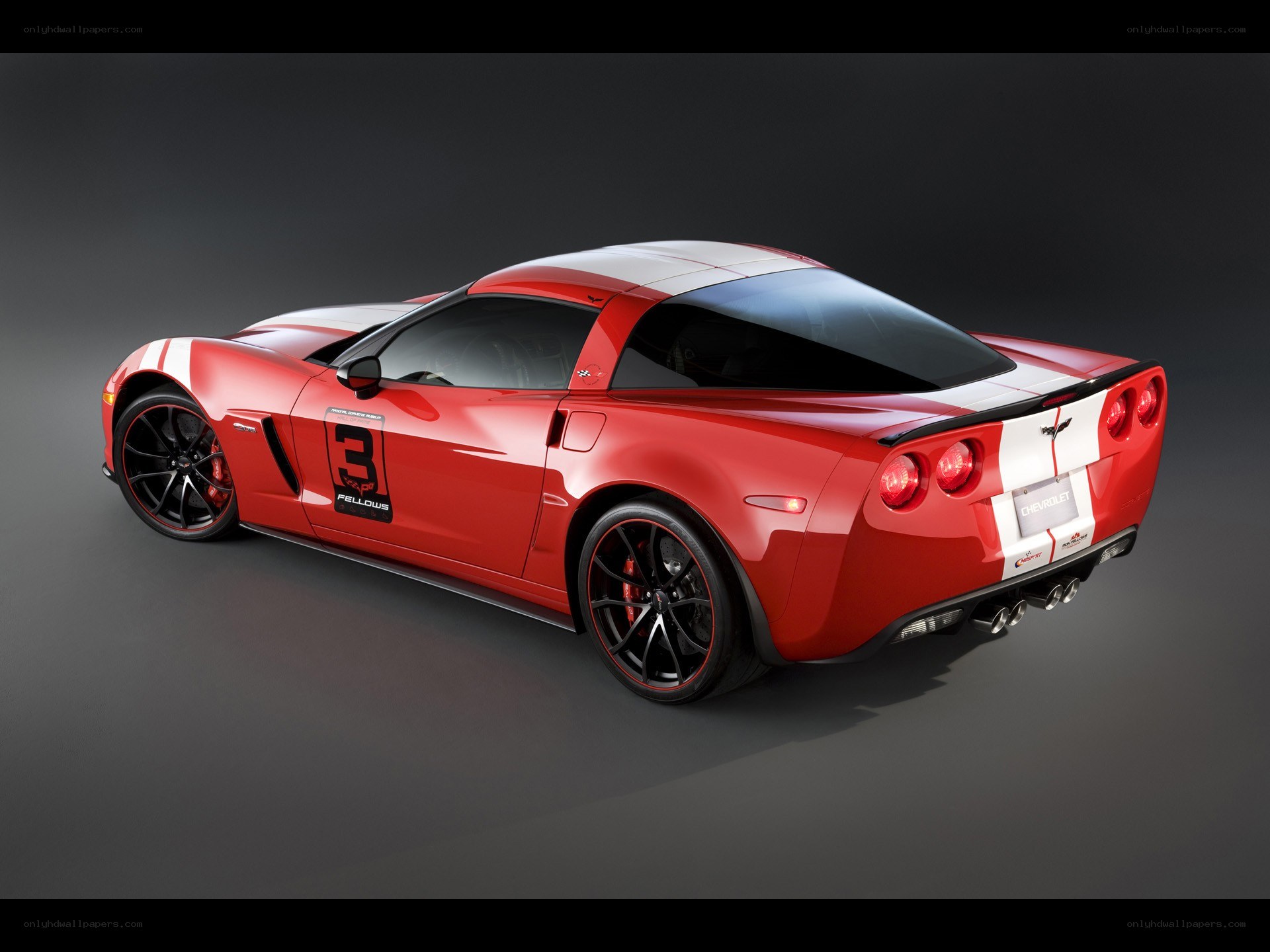 red corvette with racing stripes