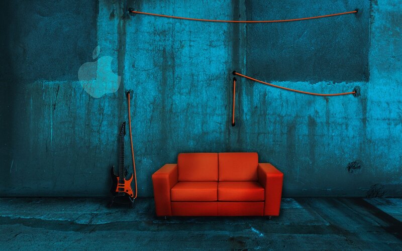 Red couch in blue room