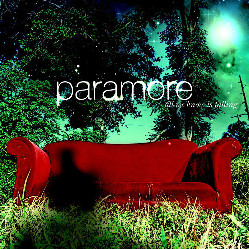 Red Couch in Grass